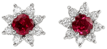 Ruby earrings with diamonds set in a halo setting design in platinum